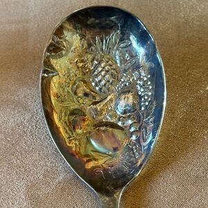 Elegant Silver Spoon with Fruit Design